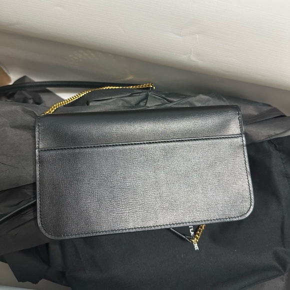 SAINT LAURENT
MONOGRAM LEATHER PHONE HOLDER W/STRAP - Picture 3 of 6